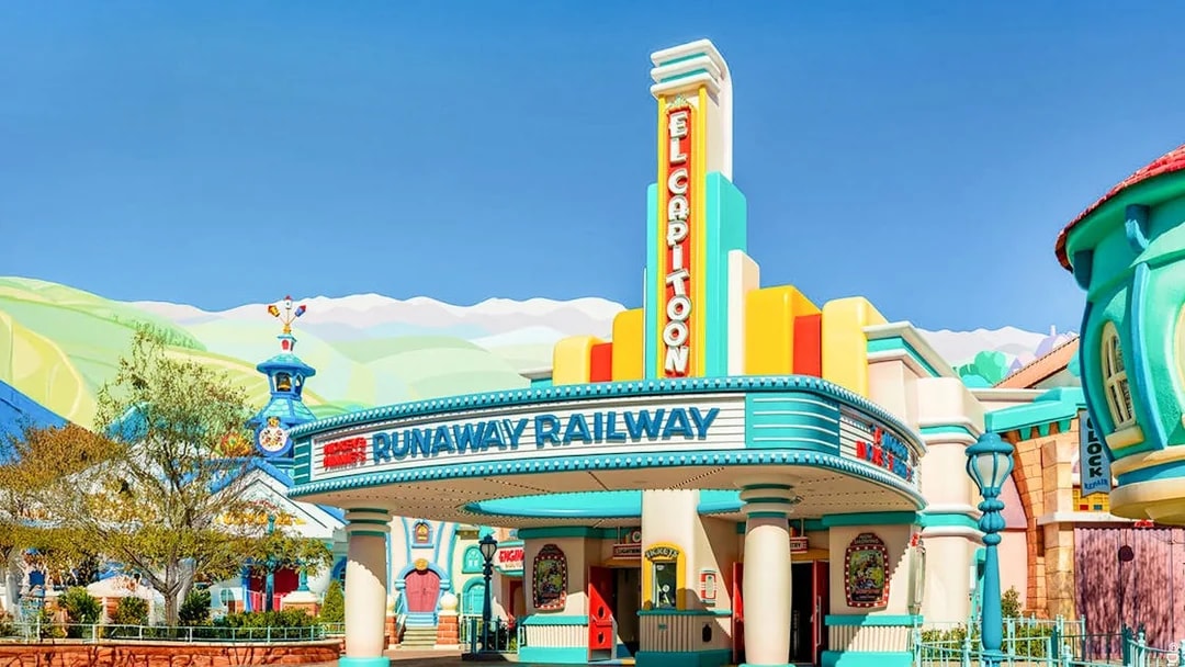 Runaway Railway entrance at Disneyland Park, California, featuring colorful art deco design.