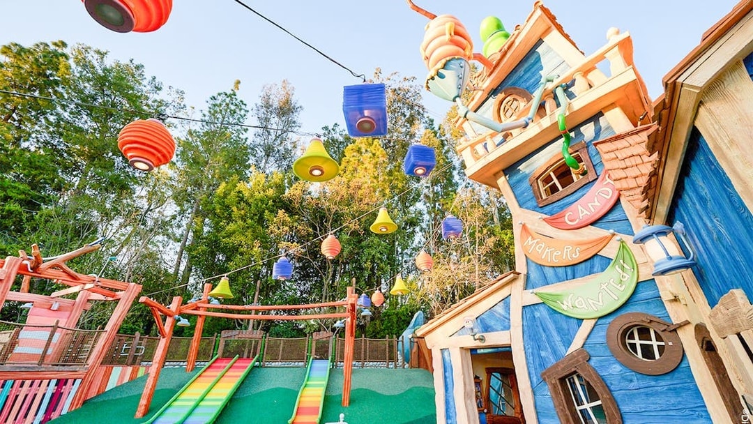 Colorful slides and whimsical building in Mickey's Toontown at Disneyland Park, California.