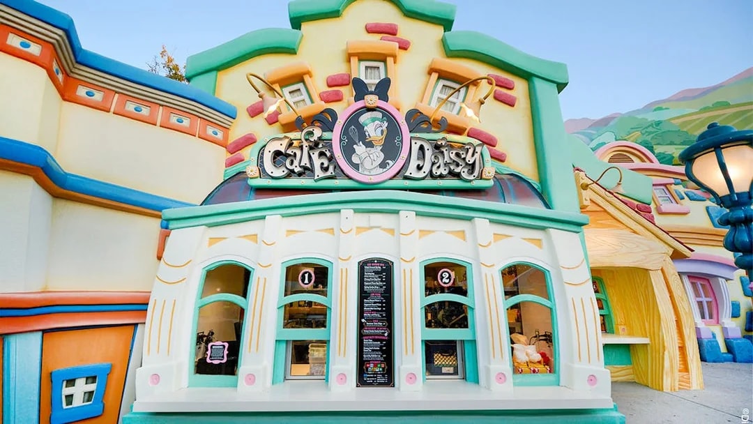 Cafe Daisy entrance with colorful facade at Disneyland Park, California.