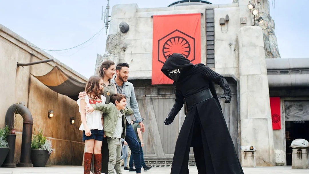 Guests interacting with a Star Wars character at Disneyland Park, California.