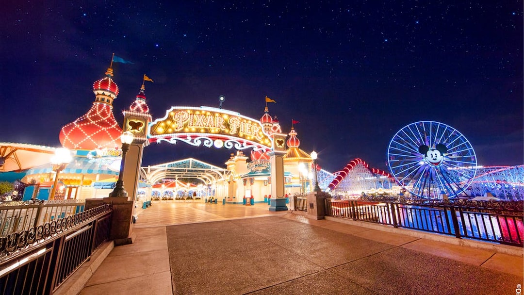 Pixar Pier entrance and Mickey Ferris wheel at Disneyland Adventure Park, California.