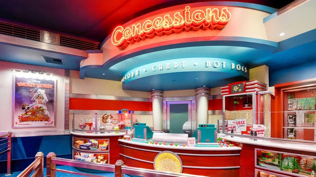 Concession stand at Disneyland Park, California offering popcorn, candy, and hot dogs.
