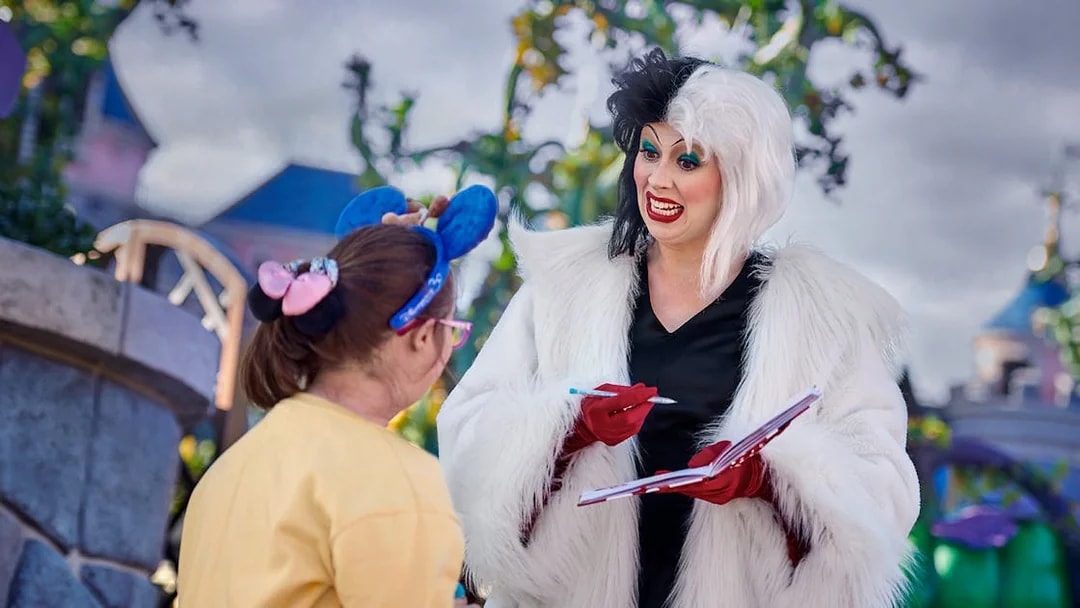 Character interaction at Disneyland Paris with a guest.