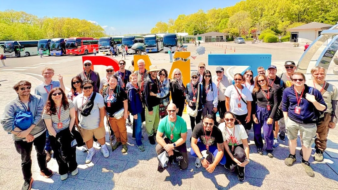 Tour group at DMZ sculpture, Imjingak tourist area, South Korea.