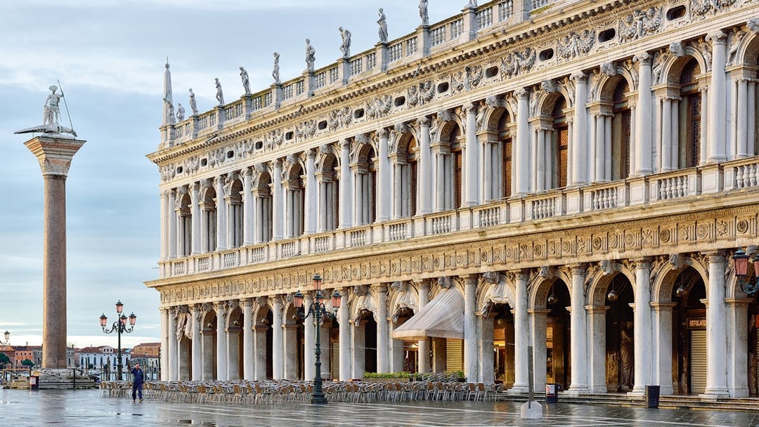 Doge's Palace exterior with columns and statues, Venice, part of 11 museum pass.