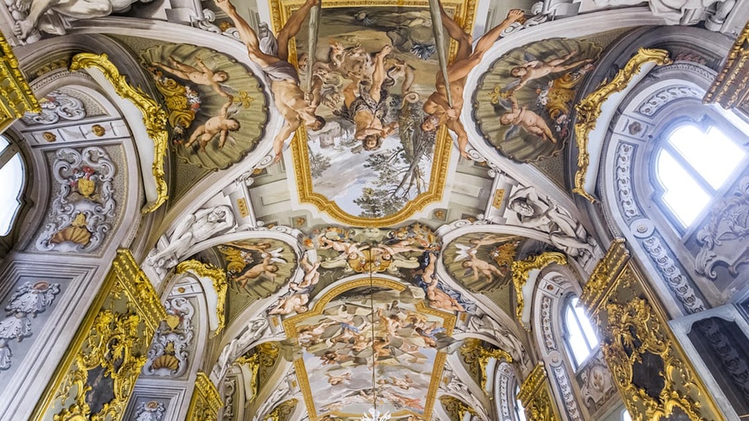 Doria Pamphilj Gallery ceiling with intricate frescoes and gold detailing.
