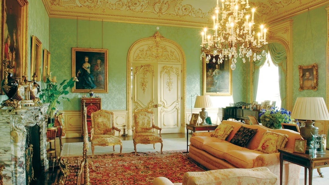 Highclere Castle drawing room with ornate decor and chandelier on Downton Abbey tour.