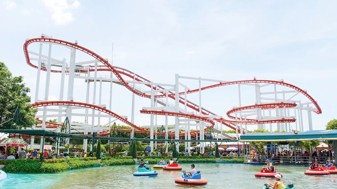 Roller coaster and bumper boats at Dream World Bangkok.
