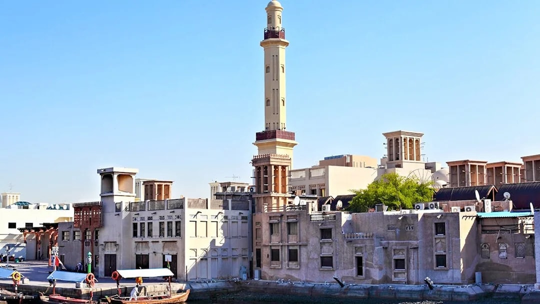 Historic Al Fahidi District with wind towers and minaret, Dubai.