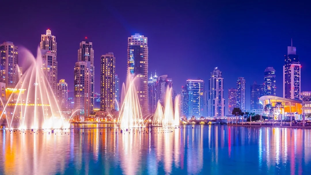Dancing water fountain show with Dubai skyline during 2-hour luxury dhow dinner cruise.
