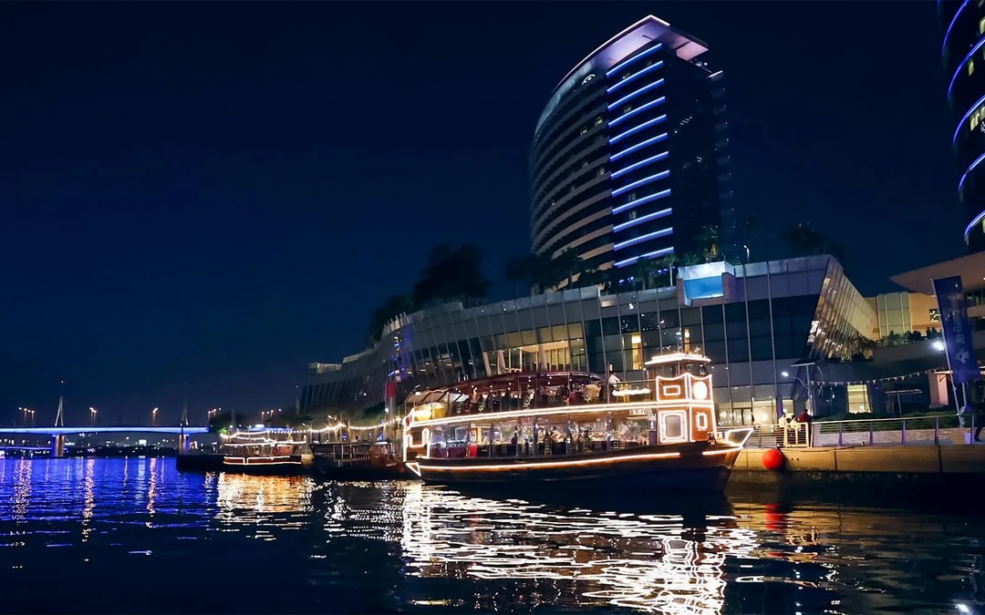 Dine & Dazzle Evening Package: Dubai Canal Dinner Cruise with Unlimited Drinks + La Perle Show Image 9