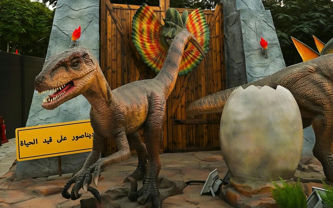 Dinosaur display with egg at Dino Live, Dubai Garden Glow.