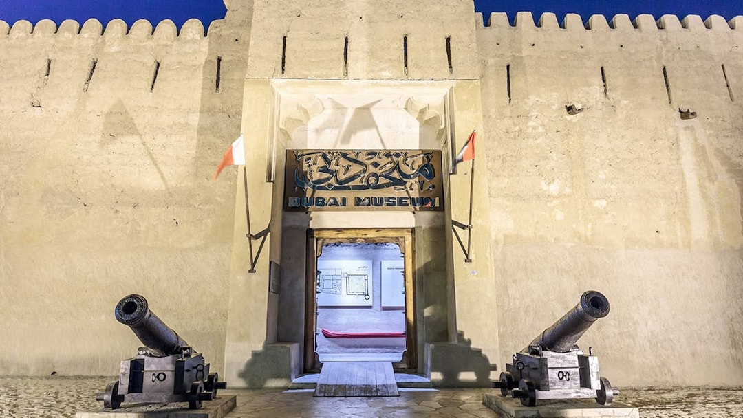 Dubai Museum entrance with cannons, part of Half Day Sightseeing Tour of Dubai.