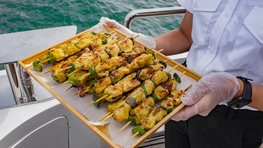Grilled skewers served on Superyacht TriDeck Cruise.