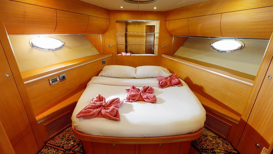 Luxurious cabin interior on a private yacht rental in Dubai.