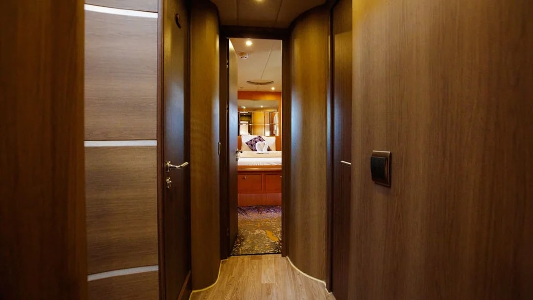 Hallway leading to a bedroom on the VERONIKA Private Luxury Yacht.