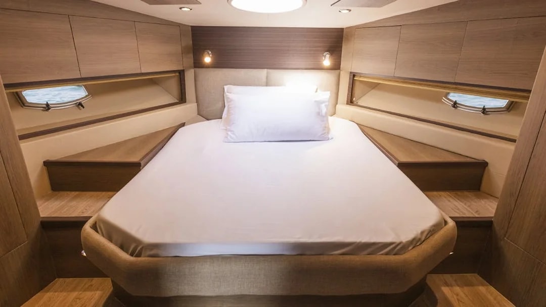 Luxurious cabin interior on a 46 ft private yacht rental in Dubai.