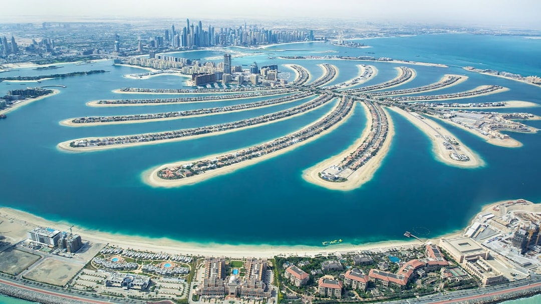 Aerial view of Palm Jumeirah and Dubai skyline during a private helicopter tour.