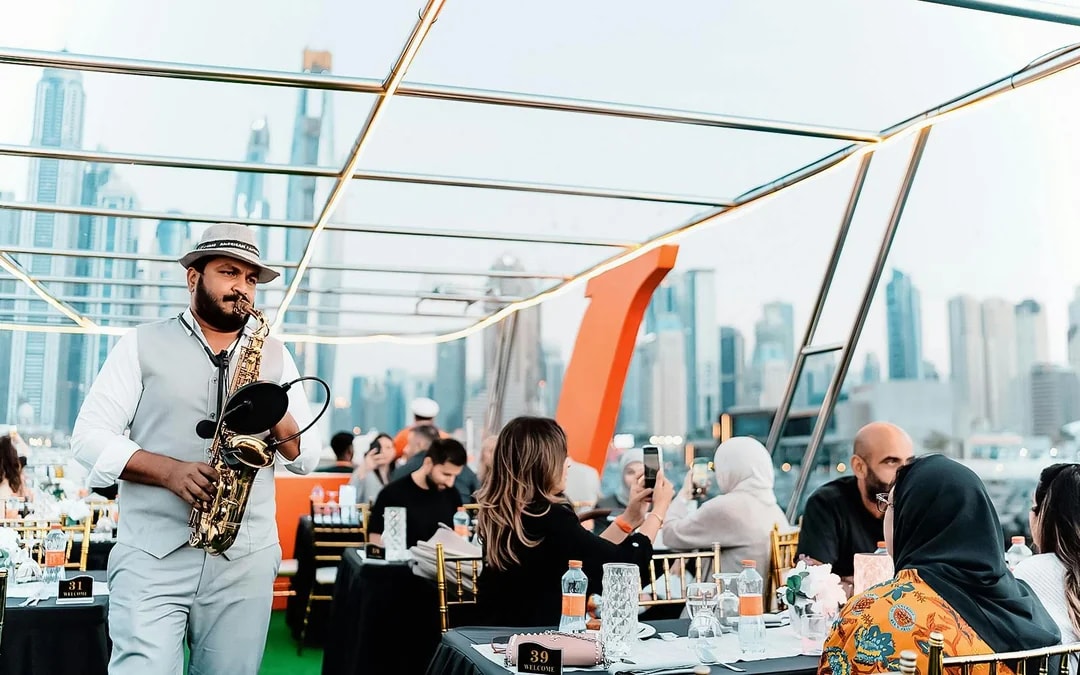 From Dubai Marina: 1.5-Hour Sunset/Dinner Cruise with Open Bar, Live Music & International Buffet Image 6