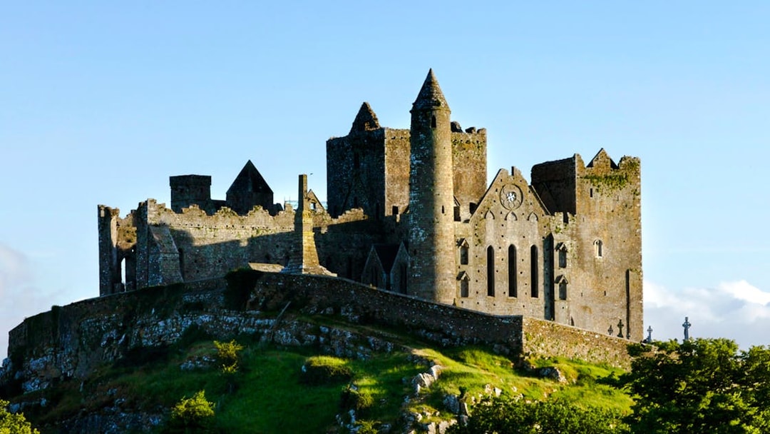 Rock of Cashel exterior with medieval stone structures in County Tipperary, Ireland.