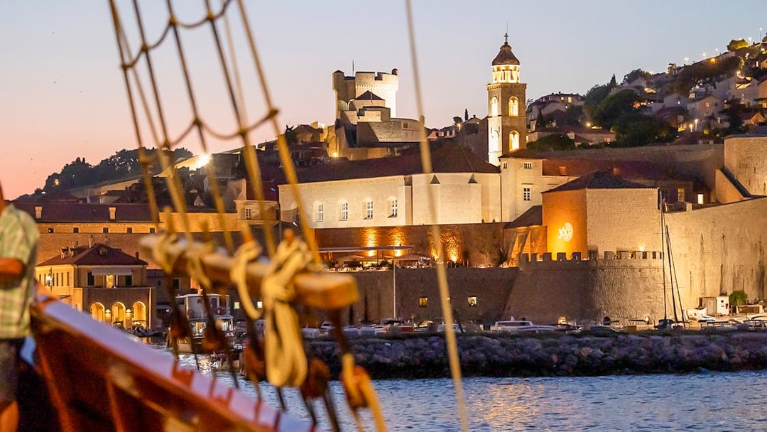 Dubrovnik old town view from Karaka Ship during sunset cruise.