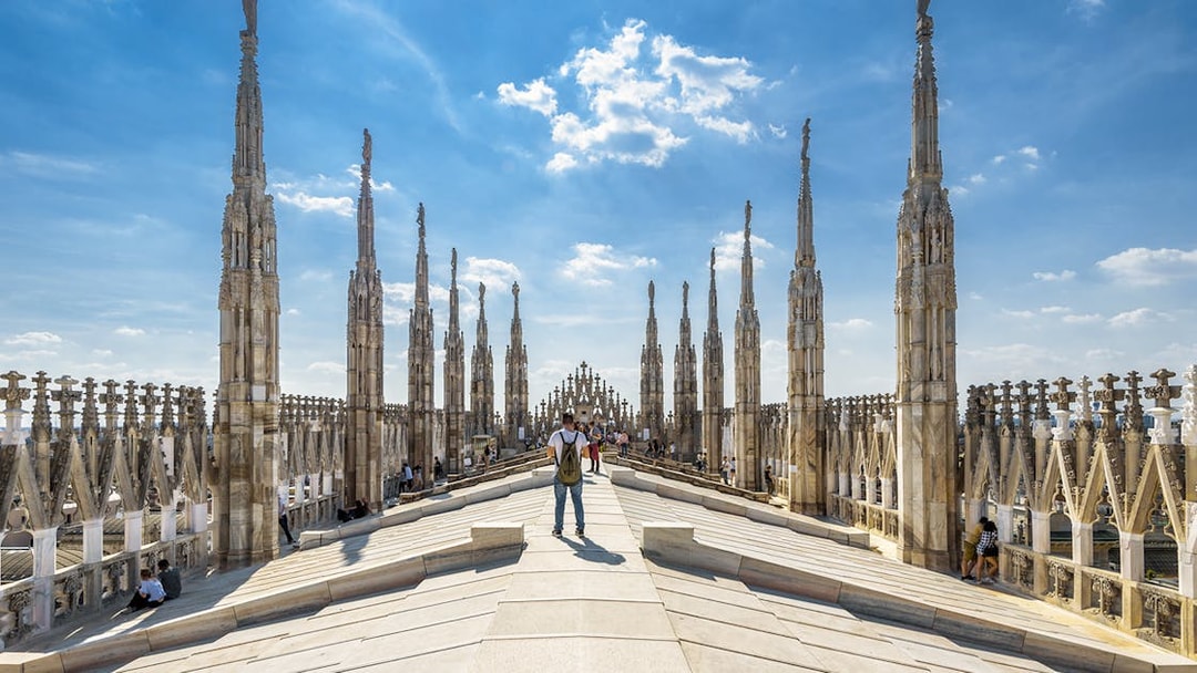 Rooftop view of Milan Cathedral with spires, part of the Official Milano Pass experience.