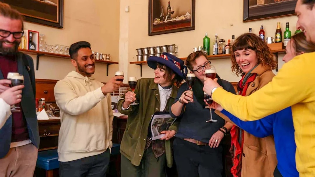 Group enjoying drinks on Eating London: Heart of 'The City' Food Tour.