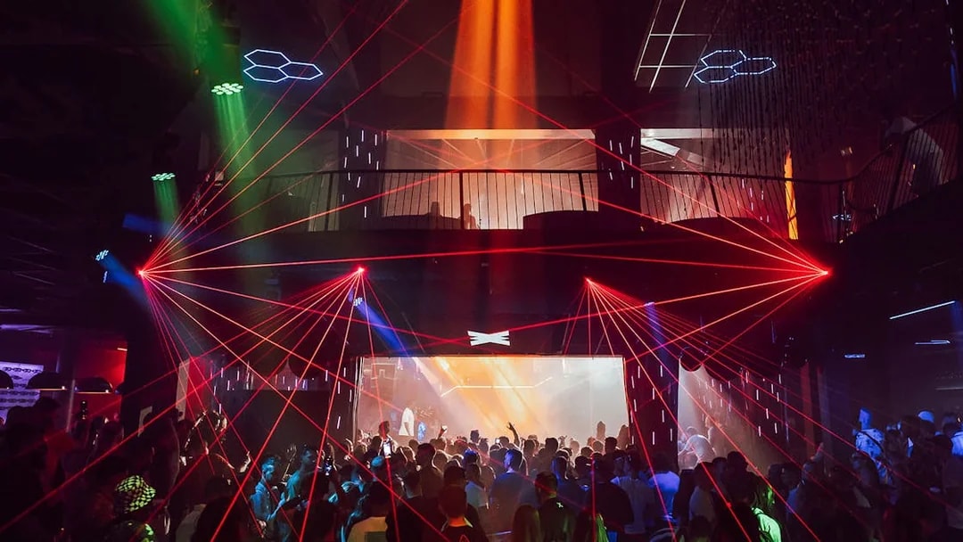 Crowd enjoying a vibrant laser light show at Eden nightclub on Wednesday with Todd Terry.