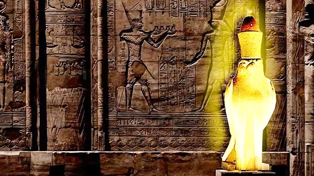 Edfu Temple hieroglyphs illuminated during Sound and Light Show.