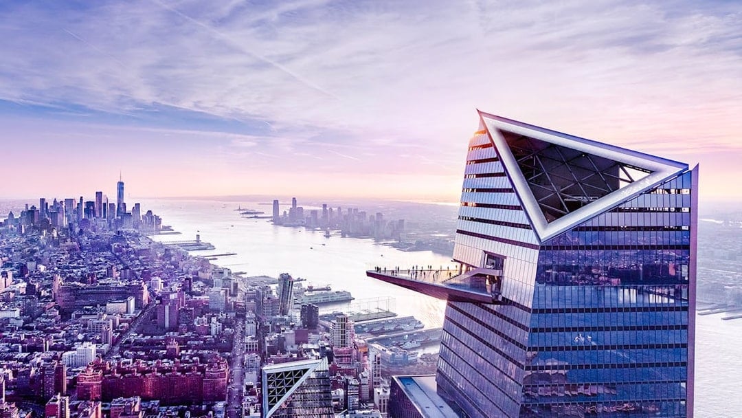 Aerial view of The Edge observation deck with New York City skyline in the background.