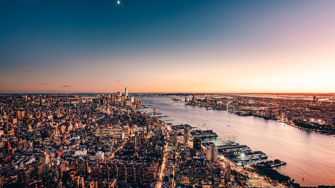 Southern view of New York City skyline from Edge at sunset, overlooking the Hudson River.