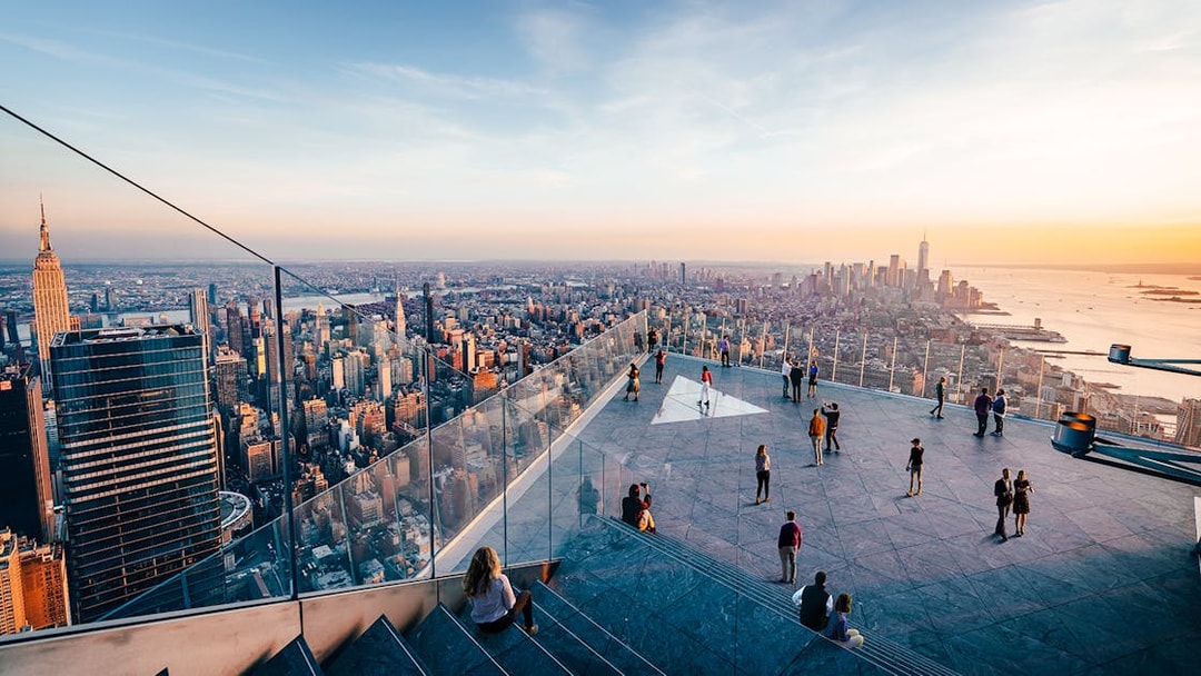 Visitors enjoying the view from the outdoor sky deck of Edge in New York City.