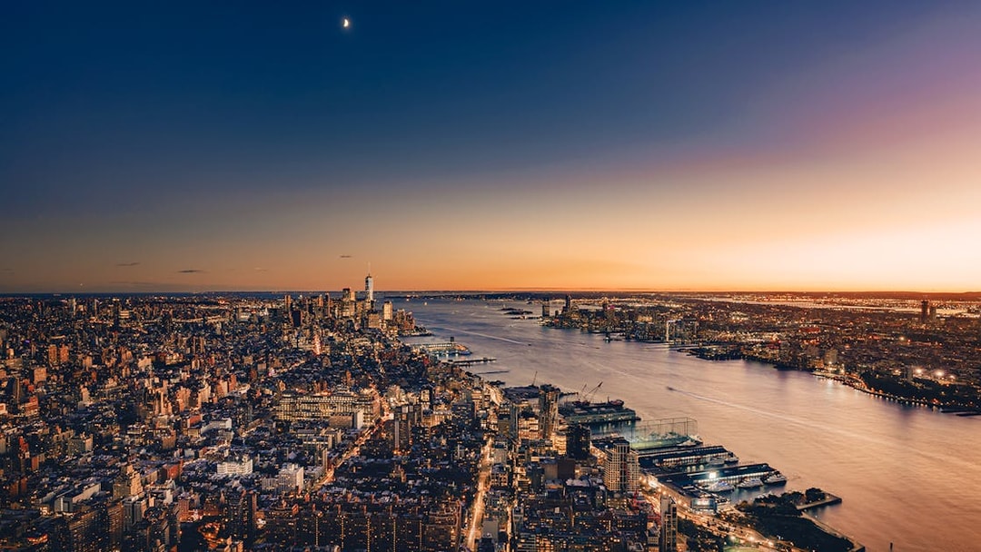 New York City skyline at sunset from Edge Observation Deck, overlooking the Hudson River.