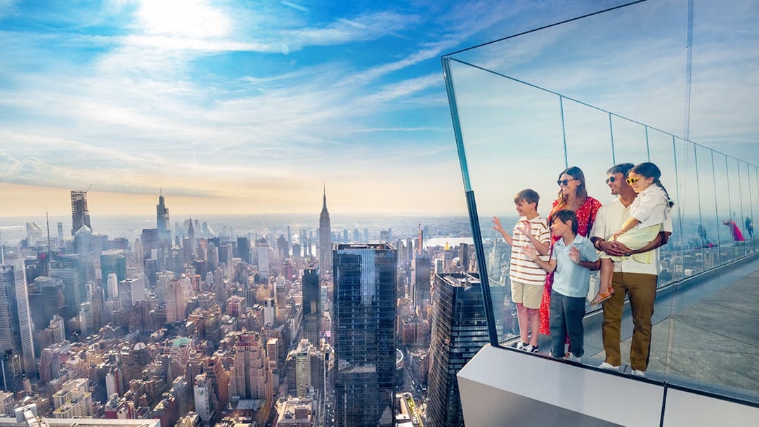Family enjoying New York City skyline from Edge Observation Deck.