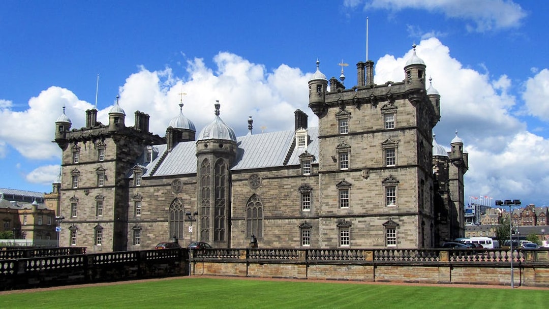 George Heriot's School in Edinburgh with historic architecture and green lawn.