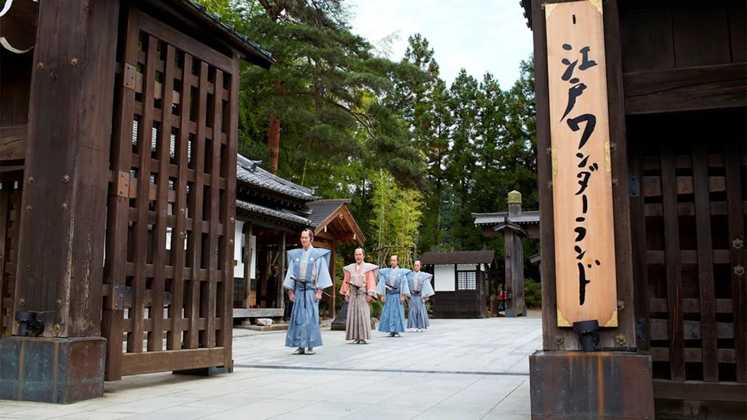 Samurai actors walking through Edo Wonderland entrance in Nikko, Japan.