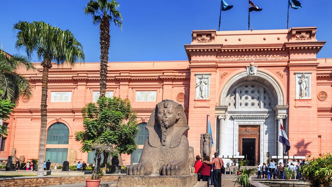Sphinx statue in front of the Egyptian Museum entrance in Cairo, Egypt.