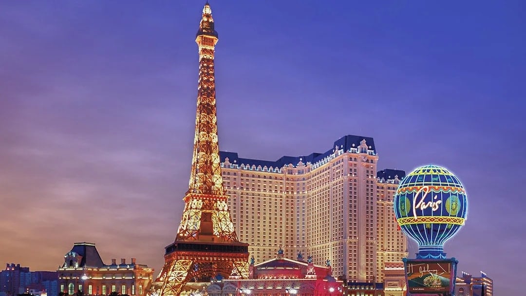 Eiffel Tower replica illuminated at Paris Las Vegas Hotel.