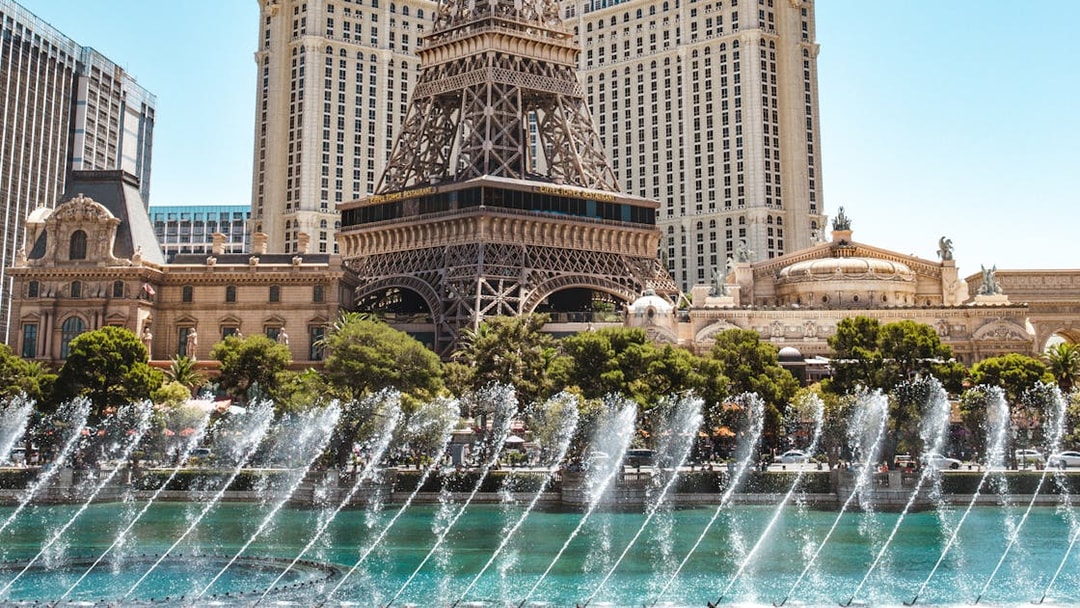Eiffel Tower replica with fountain display in Las Vegas.