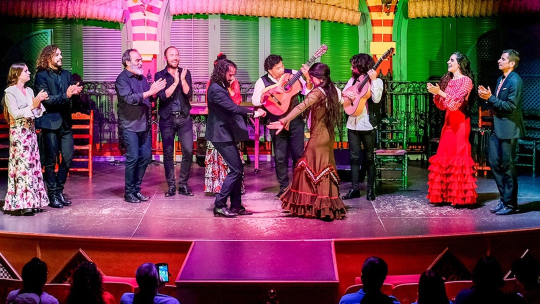 Flamenco dancers performing on stage at Only Flamenco, Seville.