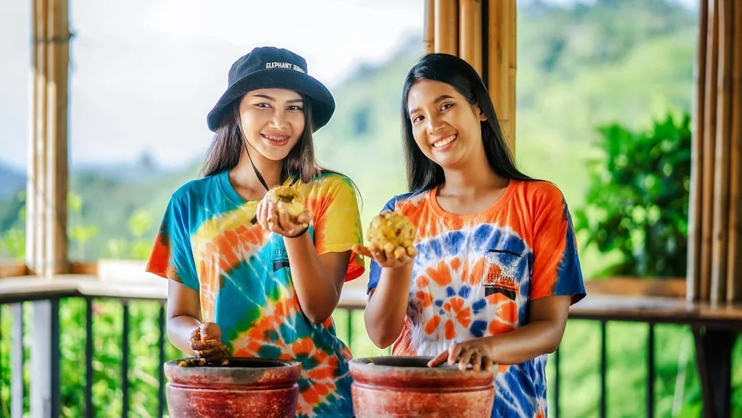 Visitors preparing elephant food at Elephant Jungle Sanctuary, Phuket.