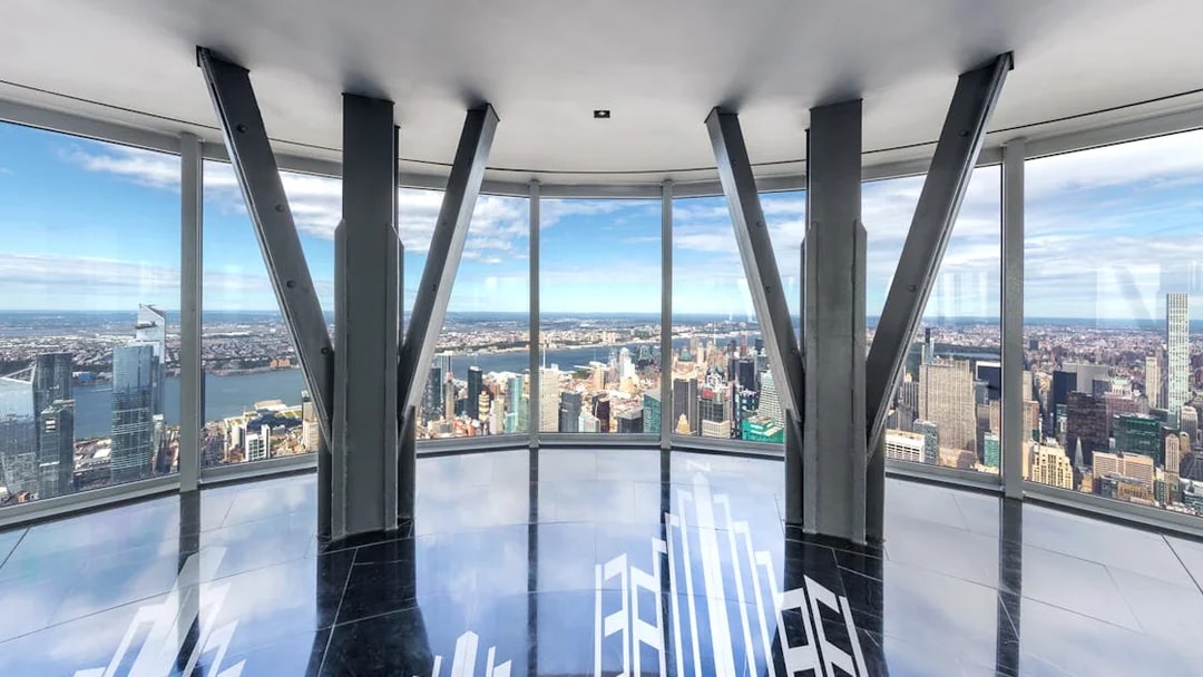 Empire State Building Observatory view of New York City skyline with Hudson River.