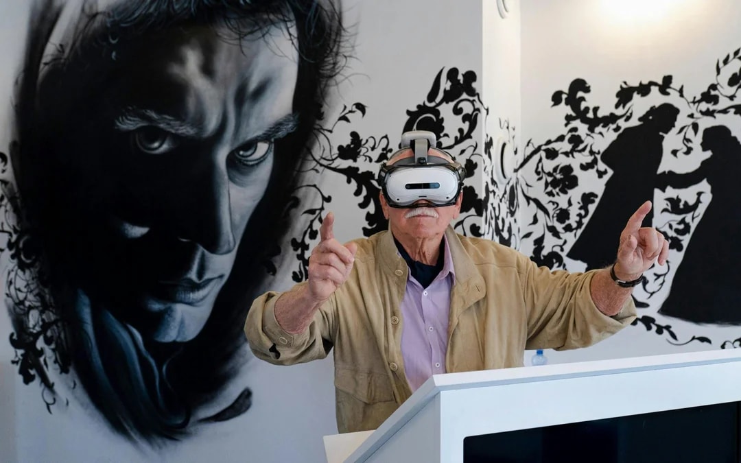 Guests using VR glasses at Mozart Interactive Museum, Prague.