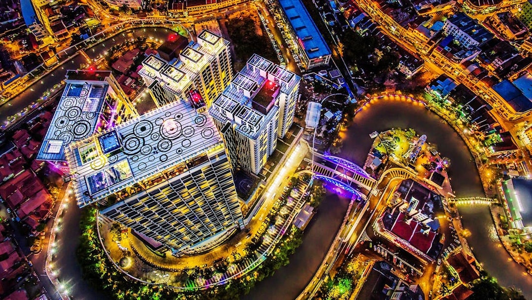 Aerial view of Melaka cityscape and coastline from The Shore Sky Tower.