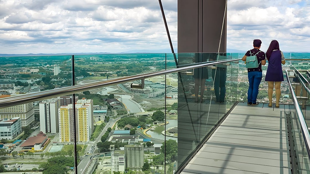 Visitors enjoying panoramic views from The Shore Sky Tower observation deck.