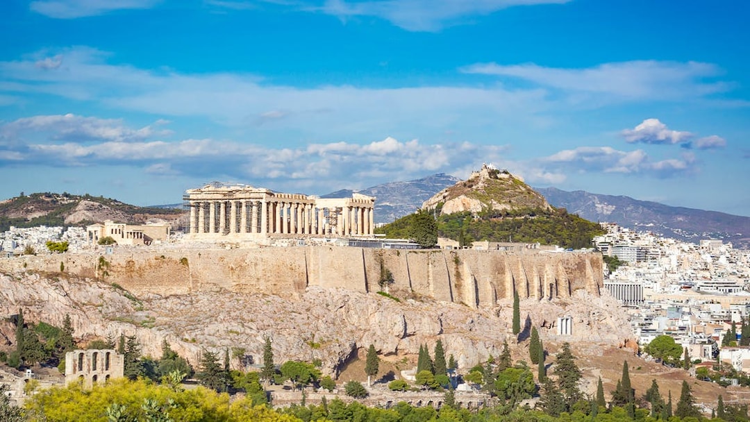 Athens Acropolis with Parthenon and Lycabettus Hill in the background.