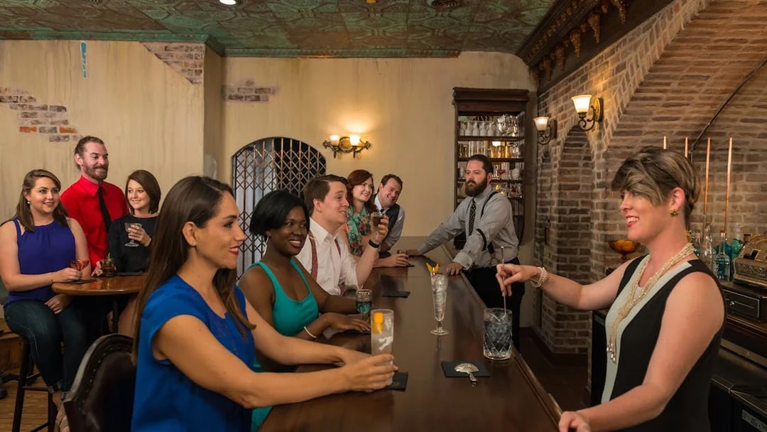 Guests enjoying drinks at the bar in the American Prohibition Museum.