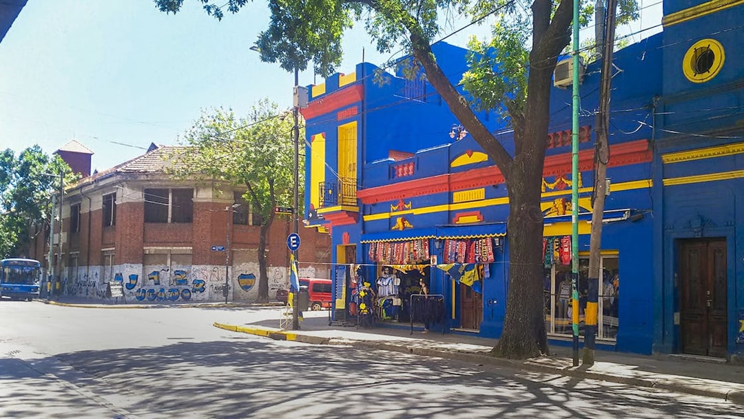 Shop with blue and yellow facade near La Bombonera stadium, Buenos Aires.