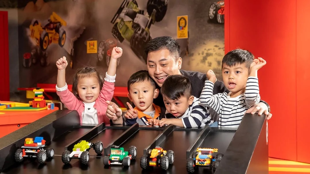 Children racing LEGO cars at LEGOLAND® Discovery Centre Hong Kong.