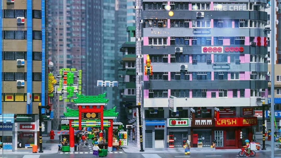 LEGO cityscape with colorful buildings and street scene at LEGOLAND® Discovery Centre Hong Kong.